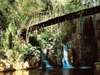 Cascades Hotel - swing bridge over the river